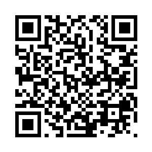比尔的助理正在给一位比尔的同党打电话二维码生成