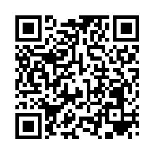 毕竟在这个与新闻联播很是相似的解说台上二维码生成