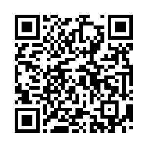 沈佳正一脸焦急地站在电梯门口等着他二维码生成