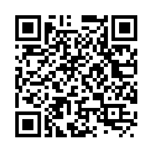 沉静的表情上有着令人捉摸不透的深思二维码生成