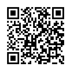 沐浴在着众人崇敬目光内的葛大炮一脸享受二维码生成