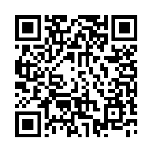 没带头盔的陆为民丝毫不顾及扑面而来的冷风二维码生成