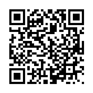 漆黑的脸庞之上只有一双眼睛透出灼目的光华二维码生成