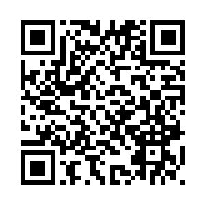 灰色皮肤的脸庞生生地显出了白意二维码生成