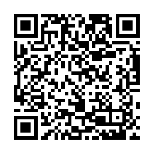 焦季礼兄弟原来是在白云机场和香港文物贩子进行交易的二维码生成