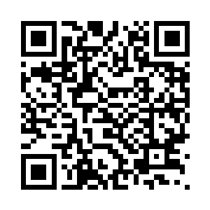 然后撇头看了一眼坐在身边的妻子二维码生成