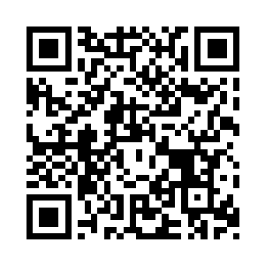 照片主角是一个颇有几分姿色的年轻女人二维码生成