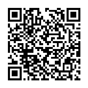 照片里的小红包就真的像一只待拆封的小红包一样二维码生成