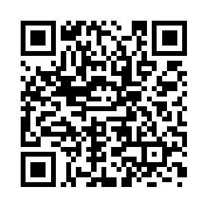熊熊烈焰舔舐着充满未来感的银白色建筑二维码生成