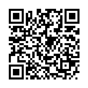 猴子怀里抱着一个木头匣子脸黑的就像是木炭二维码生成