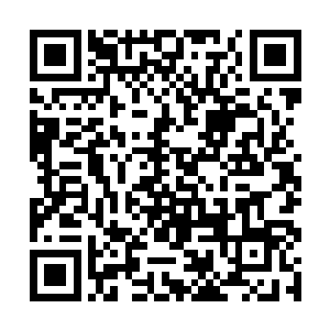 盘坐在彩虹之上合十闭眼的蓝夜菩萨突然宣了声佛号二维码生成