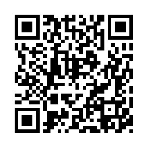 目光停留在远处一个巨大的圆环形建筑上二维码生成