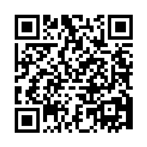 省委秘书长邱明桐坐在办公室里抽着烟二维码生成