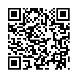 看到丁二狗正在向一个港商比划着描述什么二维码生成