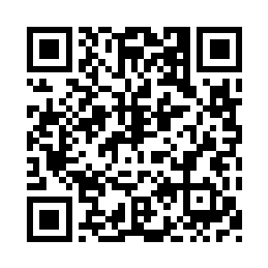 看到镜子里映着一张保养得益的女人的脸二维码生成