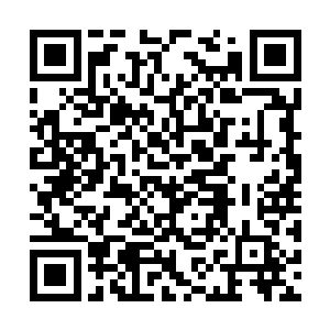 看起来就像是一个非洲来的黑人似的……可是现在二维码生成