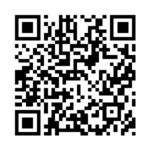 眯着眼似乎想起自己被卷入政治的那一幕二维码生成
