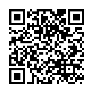 眼中的寒意和他手中的枪一样冰冷二维码生成