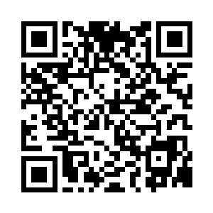 眼睛盯着放在中堂桌上的两盒透明玻璃状物二维码生成