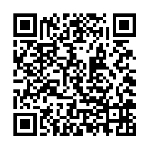 短短几个小时的暴雨已经令这里的积水达到膝盖以上二维码生成
