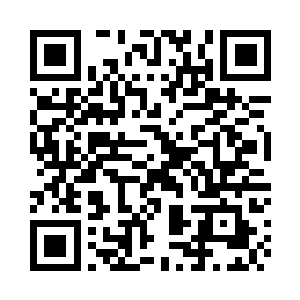 石浩天坐在蓝苍行平时做的桌案前二维码生成