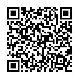 离开办公室的信息中心的主管并没有去找商团的其他管理者二维码生成