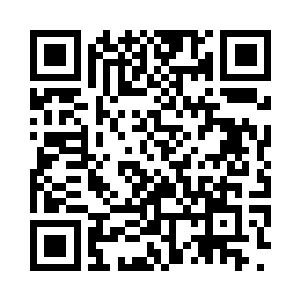 离还傻坐在哪儿看着桌子上的一大堆礼物发呆二维码生成