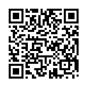 站在山腰亭子里的杨庆眺望对面山上的总镇府二维码生成