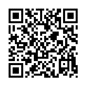 笑面佛正在笑嘻嘻地看着下首站着的一个人二维码生成
