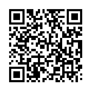 简桌宏接过报纸看着上面的一片报道二维码生成