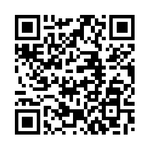 纳甲土尸手中的枪再次对着旋转的二维码生成