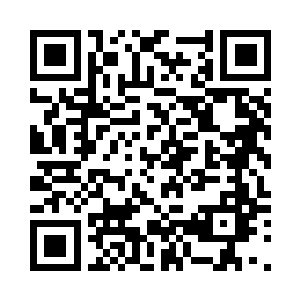 而且刚才我看到他的手上有一个标记二维码生成