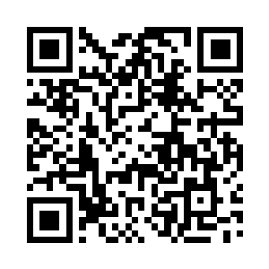 而在许振山下首第一个位置坐的就是许天狼二维码生成