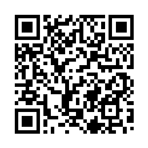 而在隔了两条街区的一栋大楼里面二维码生成