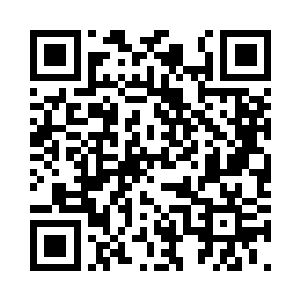 而坐在这里观赏如此糟糕景色的我们二维码生成