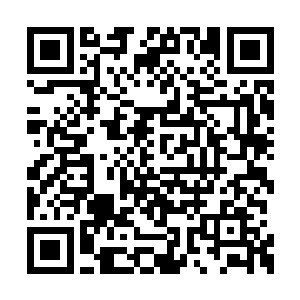 而是在距离基地大概三公里远的一处停车场降落二维码生成