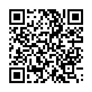 而是真实发生在当时黑袍男子身上的二维码生成