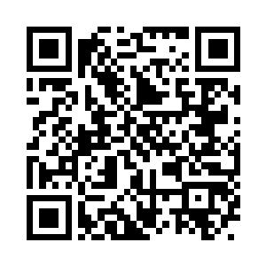 背上背着一个巨大黑色盒子的男子走了出来二维码生成