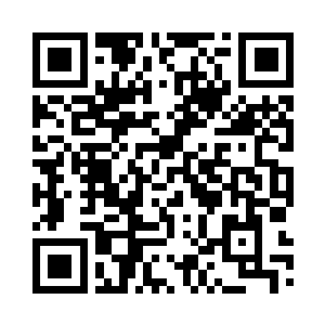 脸上在这时候露出了一个诡异的笑容二维码生成