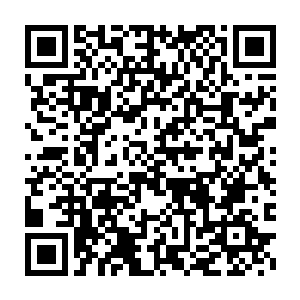 脸上归烂的阳光和古铜色的皮肤让眼前这位焦公子很有点型男的味道二维码生成