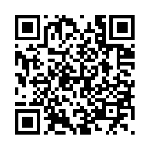 自己却打开了电视和刚拿出来的笔记本电脑二维码生成