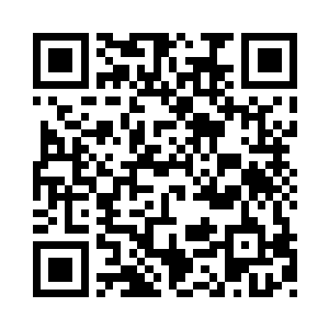 自行车慢慢抵达了这片红色砖墙的四层建筑二维码生成