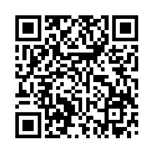 苗忠伟点头后朝着那对夫妻所居住的住宅走去二维码生成