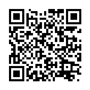 莱昂纳多一脸不敢相信地傻坐在位子上二维码生成