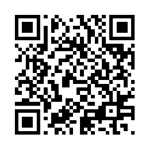 获得自由的女人竟然依然躺在那里一动也不动二维码生成