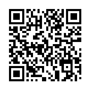 萧摇把节目单拿给前两排的师生看了一下二维码生成