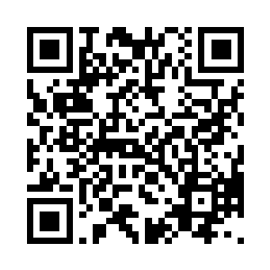 虽然黝黑的脸庞透着一点不易察觉的红二维码生成