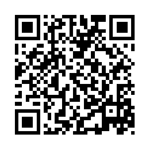 被冻得有点僵硬的脸上终于露出了一点笑容二维码生成