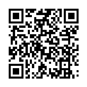 被喊到的官员笑眯眯的走过来和梅局长握手二维码生成