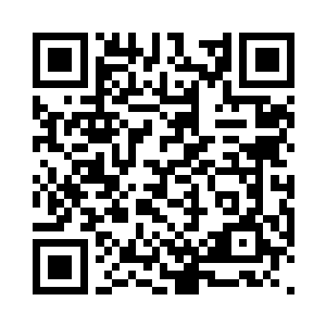 被老婆暴揍后俩人在派出所调解时的照片二维码生成